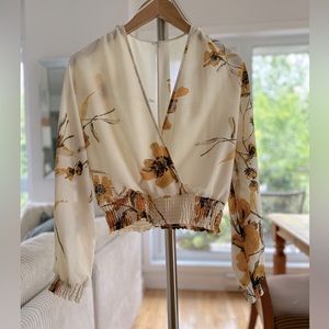 Aritzia blouse. Beige with yellow flowers